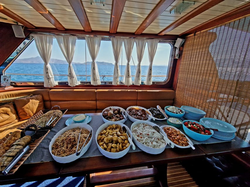Athens: Agistri, Metopi & Aegina Cruise with Meals & Drinks - Lunch on the water: Greek buffet, wine and beer, and smart dietary options