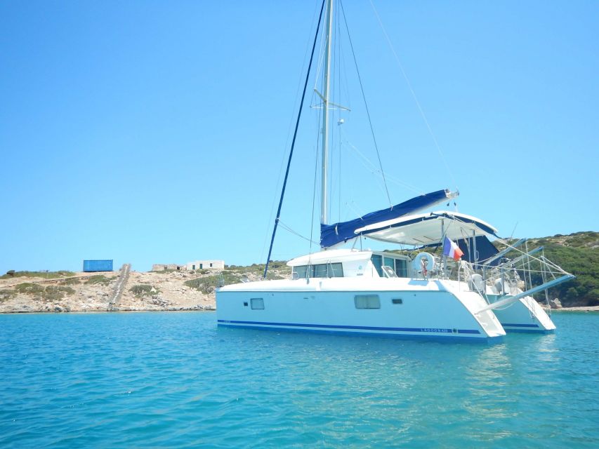 Athens: Catamaran Cruise with Fresh Lunch and Wine - Vouliagmeni Bay: Another Swim, More Cosmopolitan Energy