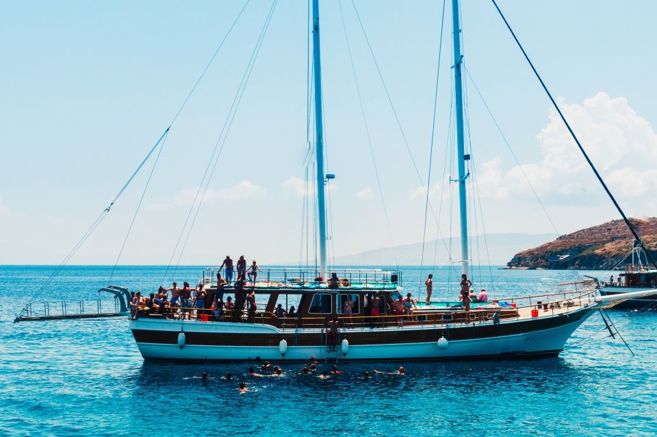 Athens: Full-Day Island Hopping Cruise with Lunch & Transfer - Agistri Island: cliffs, pine trees, and the best excuse to swim