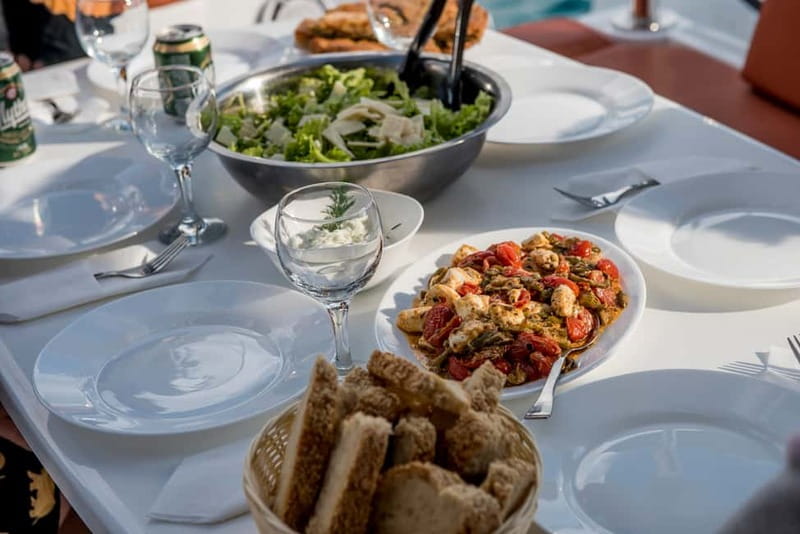Athens: Half-Day Morning Catamaran Cruise with Meal & Drinks - Lunch and onboard catering: Greek comfort food with an easy rhythm