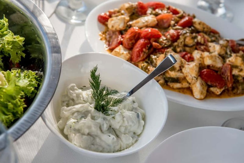 Athens: Half-Day Sunset Catamaran Cruise with Meal & Drinks - Swimming and snorkel stops in the Athenian Riviera waters