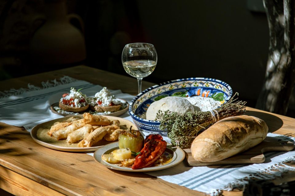 Athens: Kerameikos Stone House Cooking Class - The Garden Courtyard Meal: Wine, Sharing, and Eating What You Built