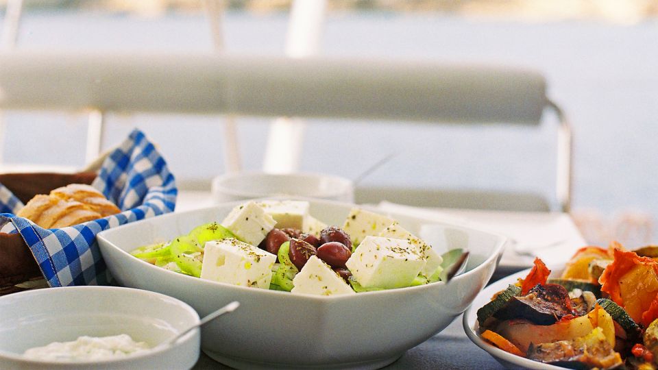 Athens: Riviera Catamaran Cruise with Meal and Drinks - Stop 2 at Vouliagmeni: BBQ lunch, sailing, and the best part of the day