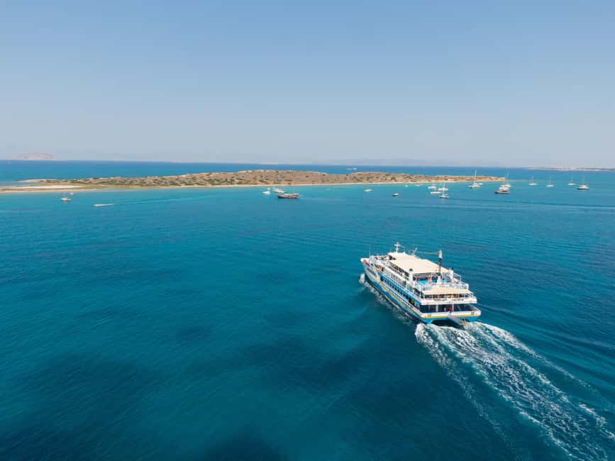 Athens: Swimming Cruise with Lunch, Wine & Live DJ on Board - Lunch on Board: Greek Buffet Comfort With Unlimited Extras