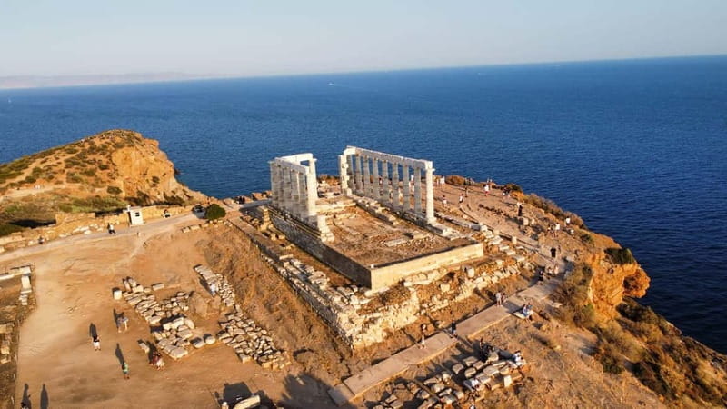 Athens: Temple of Poseidon & Cape Sounion Early Noon Tour - Inside the Temple of Poseidon experience: cliff-edge ruins and big myths
