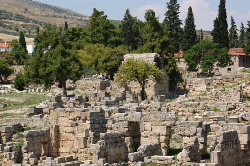 From Athens: Ancient Corinth Tour Official Guide & Tickets - Ancient Corinth: Agora and Apollo’s Temple in Real Life