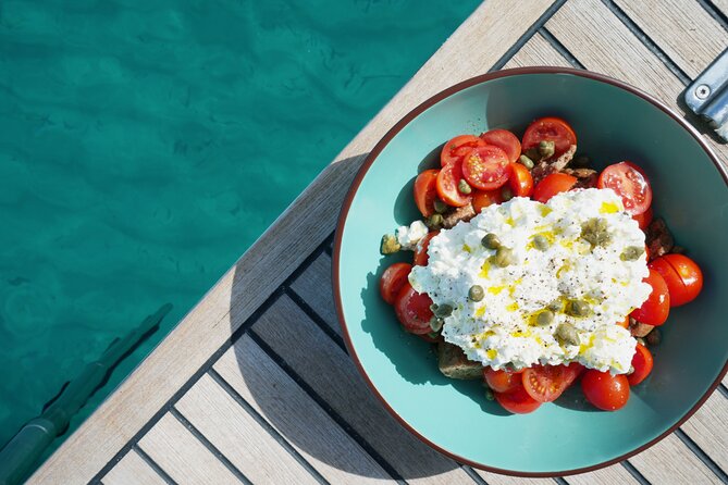 Luxury Catamaran Sunset Semi-Private & Greek Gastronomy in Athens - Vouliagmeni Beach as the bonus stop (when weather cooperates)