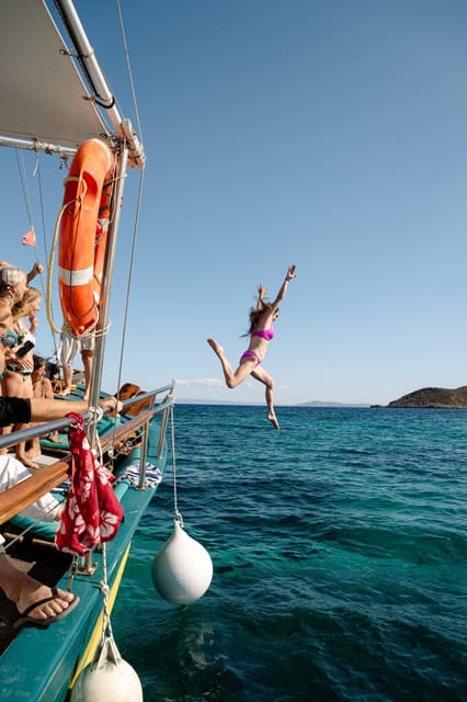 Porto Rafti: Athens Cruise Tour with Mediterranean BBQ - The on-board BBQ lunch: chicken and pork skewers plus Greek salad basics done right