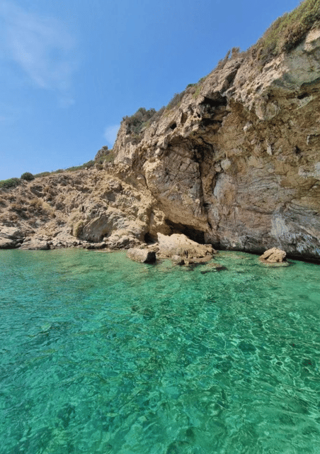 Porto Rafti: Athens Cruise Tour with Mediterranean BBQ - Transit scenery you don’t get from the city: Colossus, Natura 2000, and the Blue Lagoon
