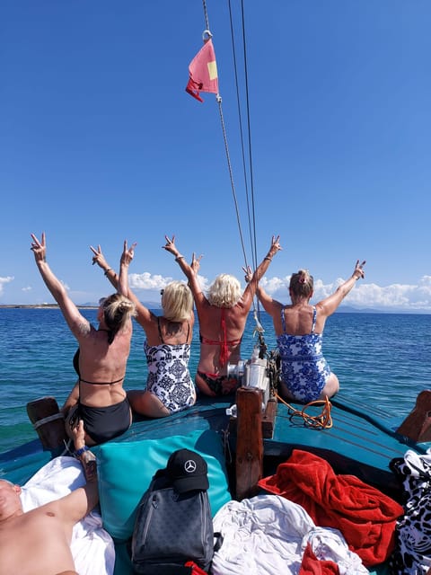 Porto Rafti: Athens Cruise Tour with Mediterranean BBQ - On-board comfort and safety: shade, lounge space, and lifeguards